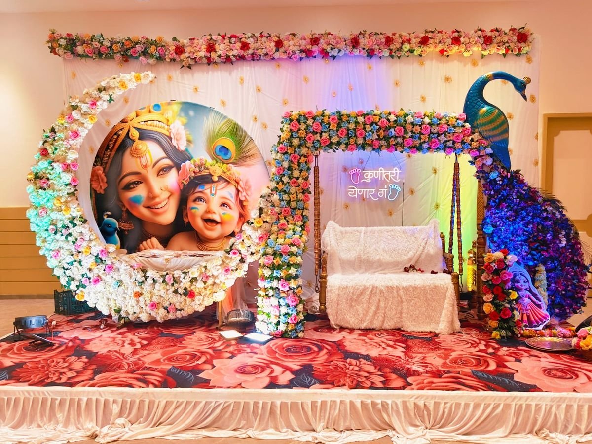 Dohale Jevan Krishna theme decoration with floral arch, peacock and decorated swing