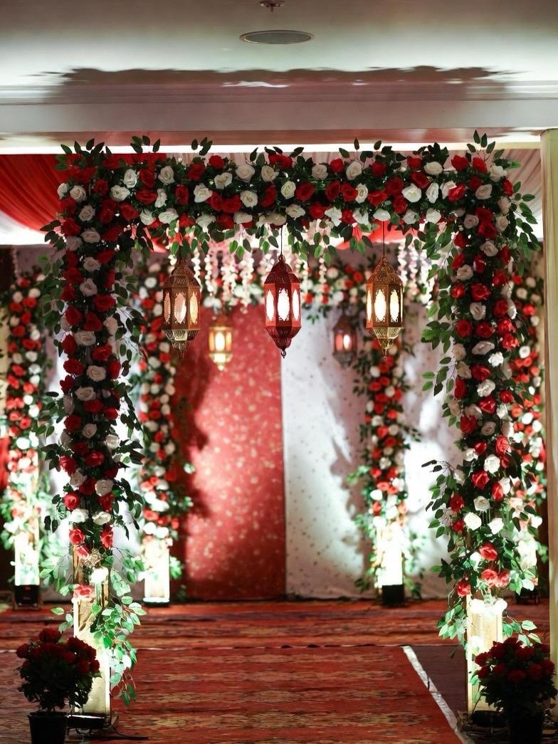 Romantic anniversary celebration decoration with balloons and floral backdrop